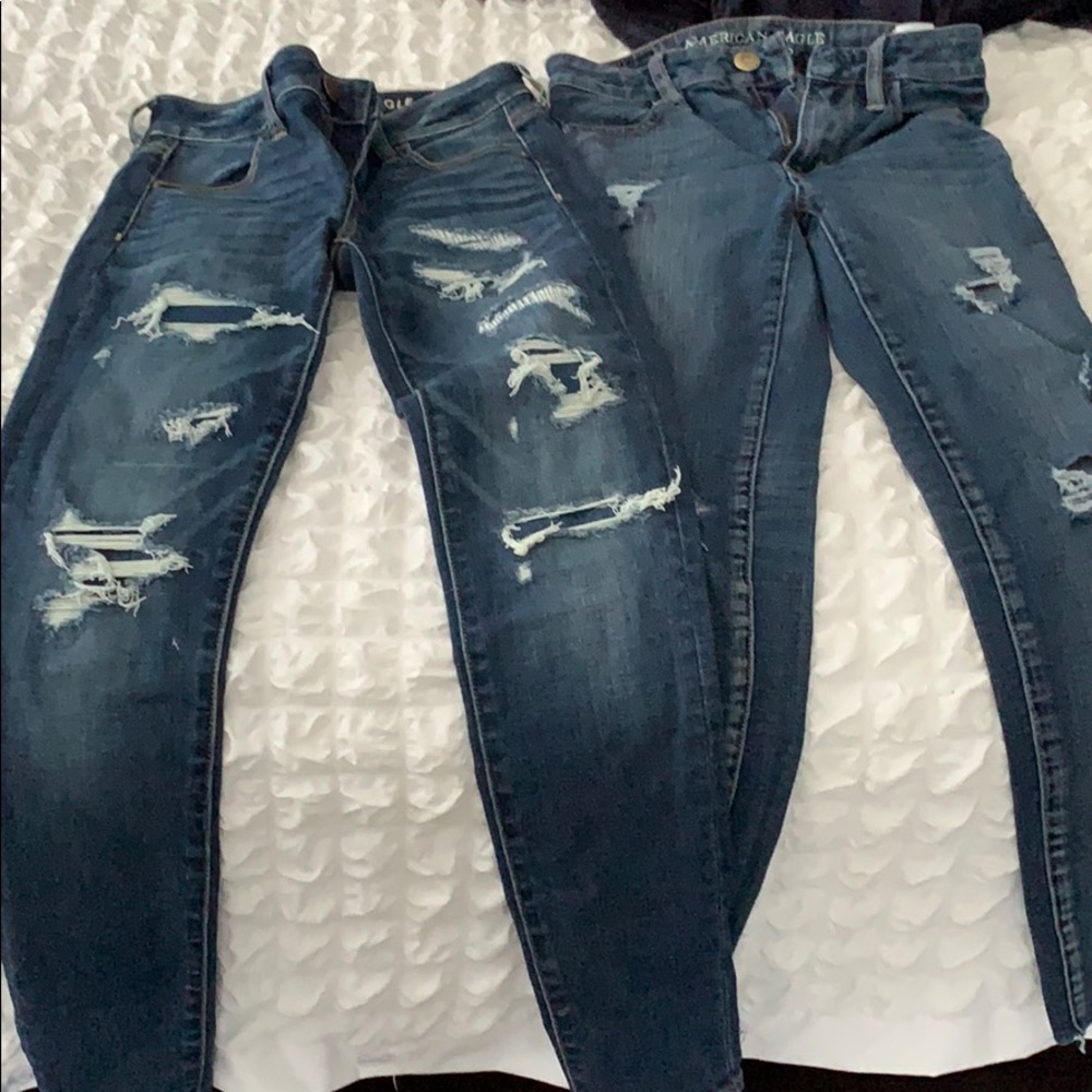 TWO PAIRS OF AEO JEANS